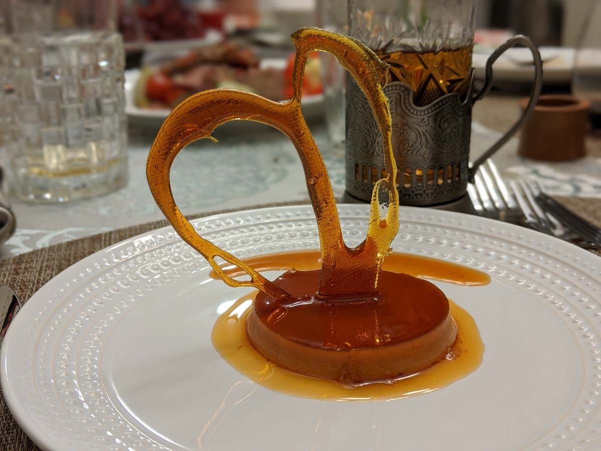 Crème caramel with spun sugar arch