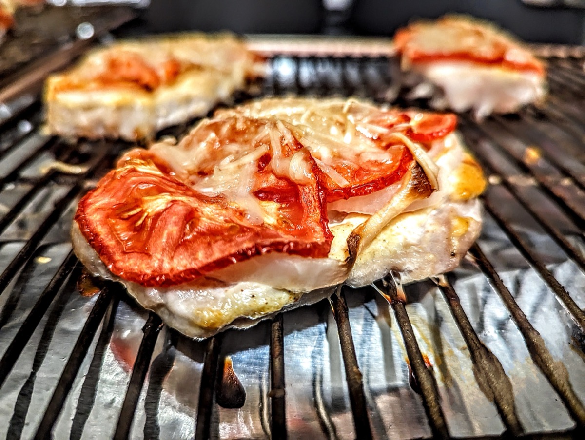 Grilled chicken breast caprese style