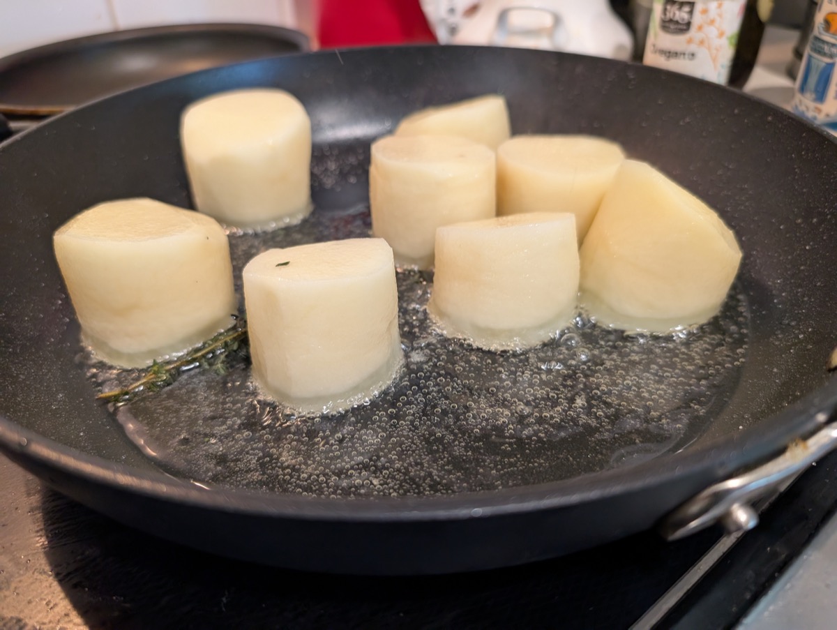 Pommes fondantes — potato cylinders melting in butter